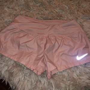 Light pink salmon nike running shorts